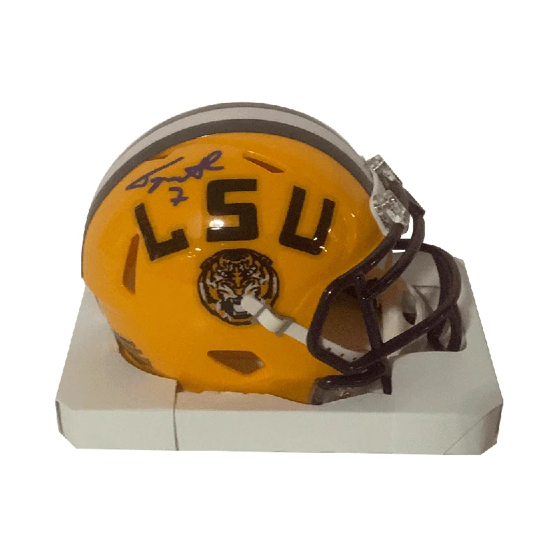 Combining football helmets with facial protection-Tyrann Mathieu Autographed LSU Gold Mini Helmet